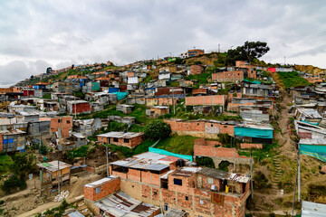 Fototapeta na wymiar anoramic overview of a shanty town in the district ciudad bolivar in bogota, colombia
