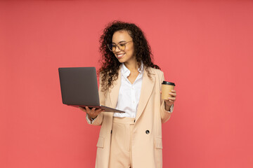 Young business woman on pink background, business and job
