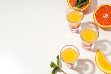 Shot with orange taste, tasty citrus shot concept