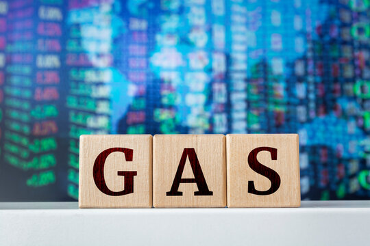 Gas - acronym from the wooden cubes with letters. Stock market trading investment financial concept.