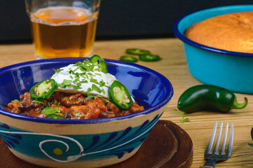 Black Bean Chili Con Carne in Bowl with Corn Bread