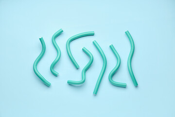 Hair curlers on blue background