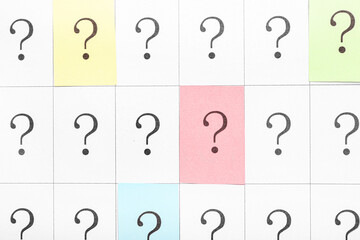 Question marks on paper, closeup