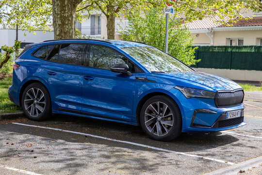 Skoda Enyaq Coupe iV car blue crossover with coupe style body sport