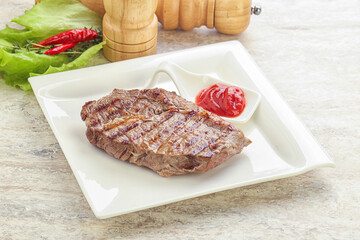 Grilled rib-eye steak beef meat