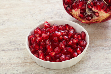 Ripe red Pomegranate seeds in the bowl