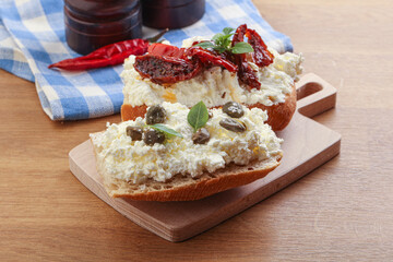 bruschetta with soft cheese capers and tomato