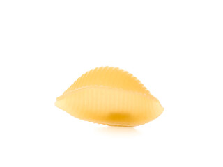 Raw conchiglie pasta isolated on white background
