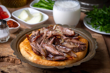 Delicious meat dish from Turkish cuisine; Konya oven kebab, tandoori kebab. Turkish name; Konya furun or firin kebabi, tandir kebabi