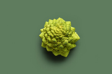 Romanesco cabbage on green background