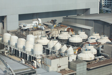 Large air compressor on the factory building