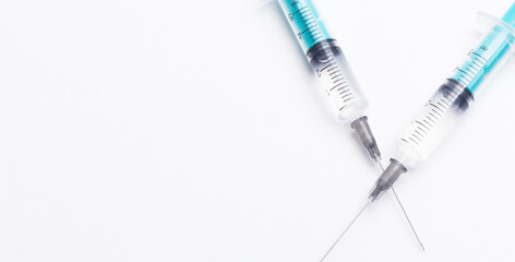 Fototapeta premium Disposable plastic syringe prepared for injection and vaccination in the hospital. The concept of medicine and health