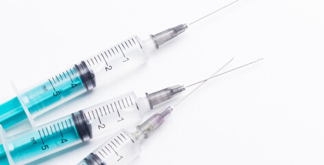 Disposable plastic syringe prepared for injection and vaccination in the hospital. The concept of medicine and health