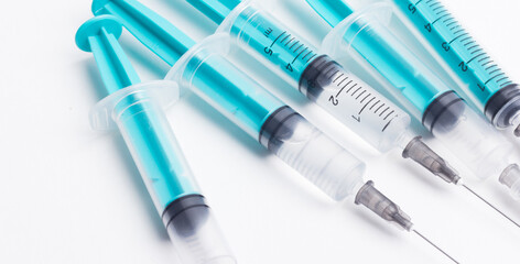 Disposable plastic syringe prepared for injection and vaccination in the hospital. The concept of medicine and health