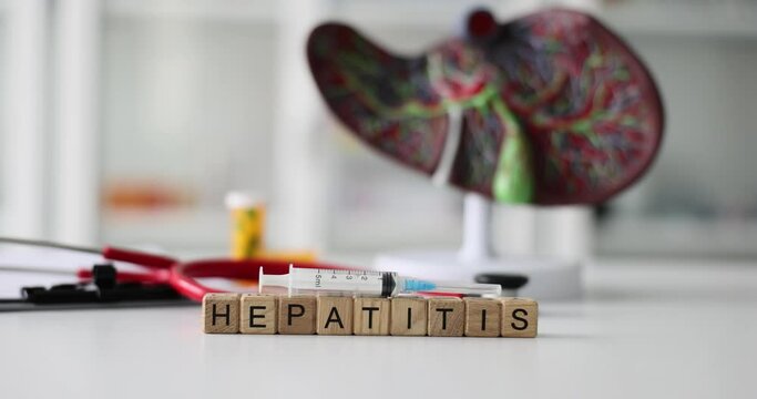 Liver anatomy syringe and hepatitis treatment in clinic. Hepatitis B symptoms, diagnosis treatment and prevention