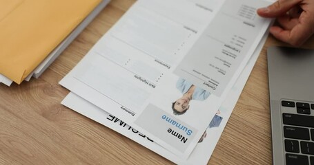 Supervisor seo puts stamp approved on resume in office. Positive decision on candidacy for employment