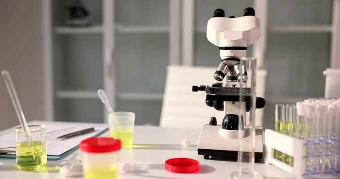 Closeup of yellow fluid of urine or petroleum products in laboratory. Urinalysis in clinic