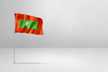 Maldives flag isolated on white concrete wall background