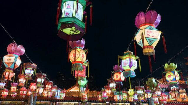 Chinese lanterns, which symbolize prosperity and good fortune, hang from ceiling wires during the Mid-Autumn Festival, also called Mooncake Festival.