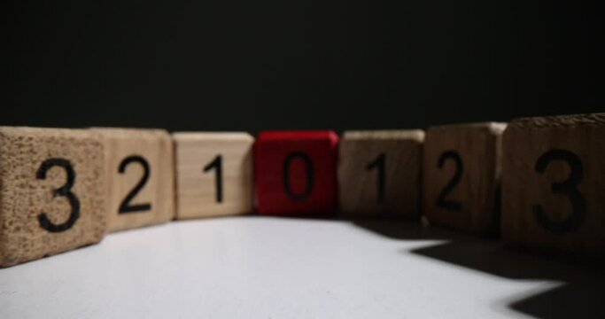 Set of wooden cubes with numbers closeup. Development of mathematical logic
