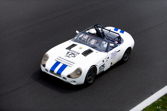 Vintage racing car, classic retro motor sport action, TVR Tuscan Speed 8 GT on asphalt race track