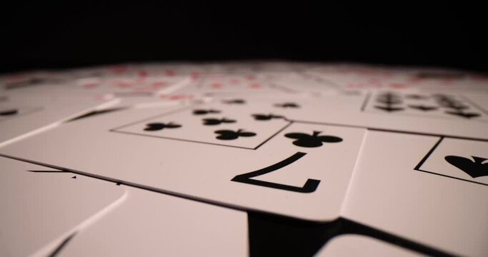 Playing poker cards on black background. Gambling cards and addiction concept