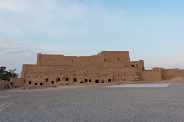 Low-angle view of the Narin Castle (Narin Qal'eh) a mudbrick castle in the town of  Meybod in Iran 