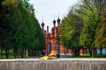Church of Peter and Paul of the late 18th century against the background of the Eternal Flame on...