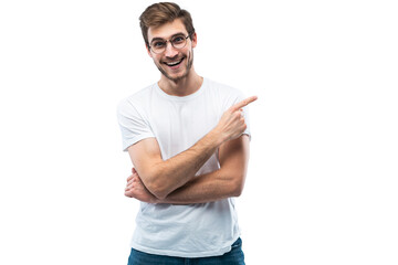 Portrait of a joyful young man pointing fingers away at copy space on his palm isolated over transparent background - 593871909