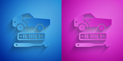 Paper cut Car theft icon isolated on blue and purple background. Paper art style. Vector