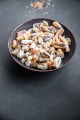 seafood frozen food Seafood Cocktail mussels, rapan, octopus, scallop, squid healthy meal food snack on the table copy space food background rustic top view pescatarian diet