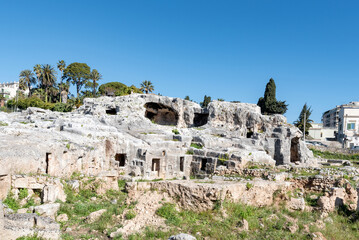 The overgrown Grotticelli Necropolis (graveyard) of the Ancient Greeks of Syracuse, Sicily. The ruins where Archimedes is supposed to be buried.