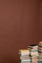 learning literacy science education stack of books on a brown background