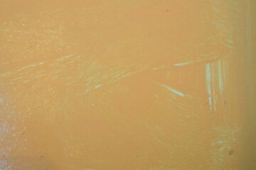 Orange oil painting on plastered wall. Oil paint texture with brush and palette knife strokes....