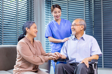 Senior asian couple having appointment with doctor for annual health check up program while the nurse is explaining the blood test result for healthy aging and longevity concept