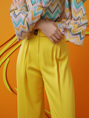 couture yellow fashion pants posing