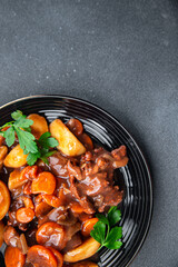 beef bourguignon beef stew dish vegetablу ready to eat meal food snack on the table copy space food background rustic top view