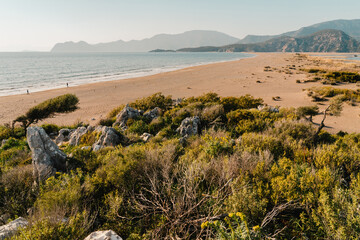 Iztuzu Beach close to Dalyan Turkey - cost line and mountains in background.