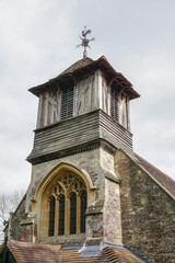 Old English chapel. exterior of village church tower. Religious building 