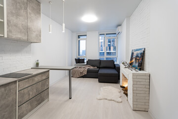 Contemporary apartment with open kitchen and living room
