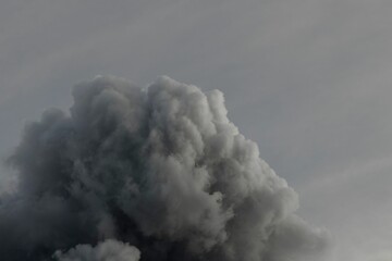Naklejka premium Big clouds in sky from above - cumulus and cumulonimbus