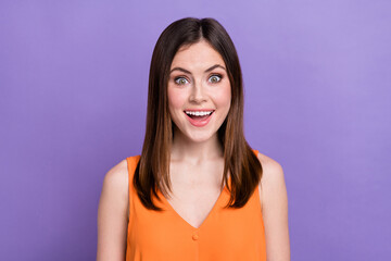 Fototapeta premium Photo of astonished lovely person toothy smile unbelievable reaction isolated on violet color background