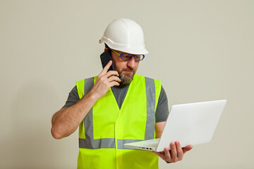 A guy works online from a laptop