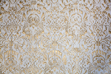 Background with various patterns of white and golden color for design
