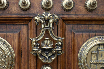 Detail of the beautiful handle of the old door of the General Captaincy of Barcelona