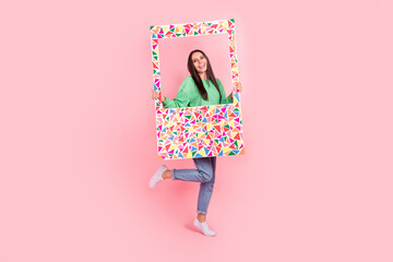 Full length photo of cheerful lovely pretty lady wear bright hold paper big frame avatar profile isolated on pink color background