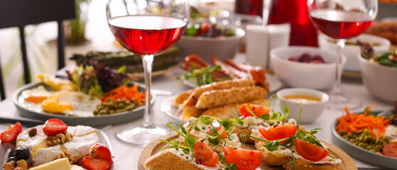 Different tasty food for brunch on table indoors, banner design