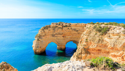 algarve landscape coast with natural arch heart shape,  Portugal in summer- travel, tourism,...
