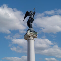 Statue of the Martyrs' Virtue at the top of column of the Monument to the Martyrs, Naples, Italy
