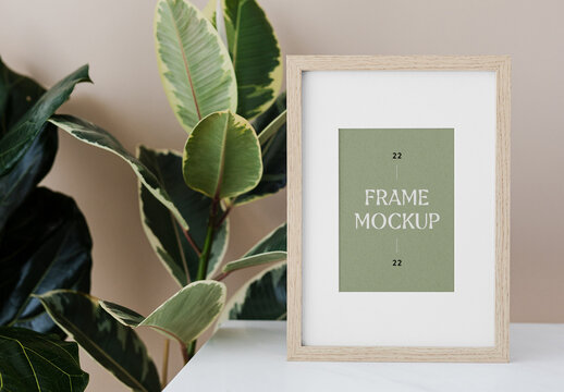Wood Frame with Plant Mockup